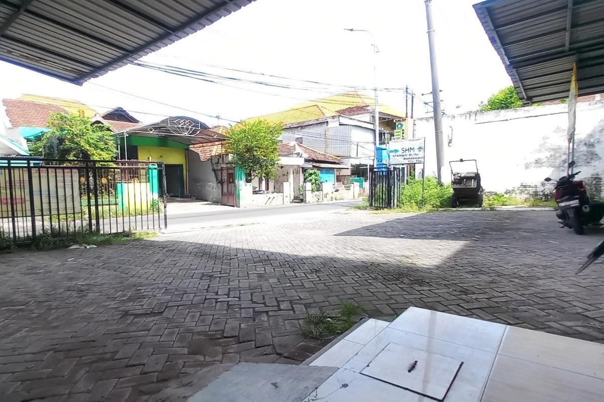 RedDoorz Syariah near RS Siti Khodijah Sepanjang - Housity