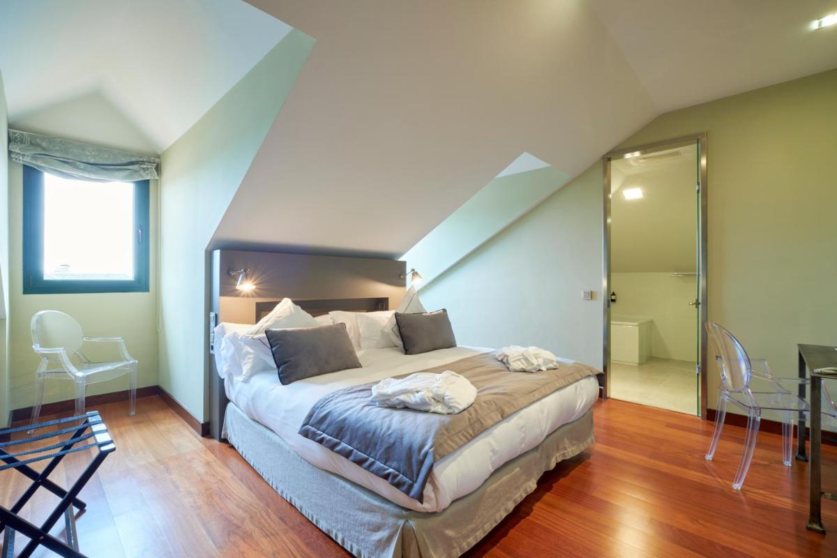 Cama o camas de una habitación en Hotel AR Isabel de Farnesio