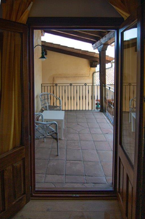 Un balcón o terraza de Hospedium Hotel Rural Abadía de Yuste