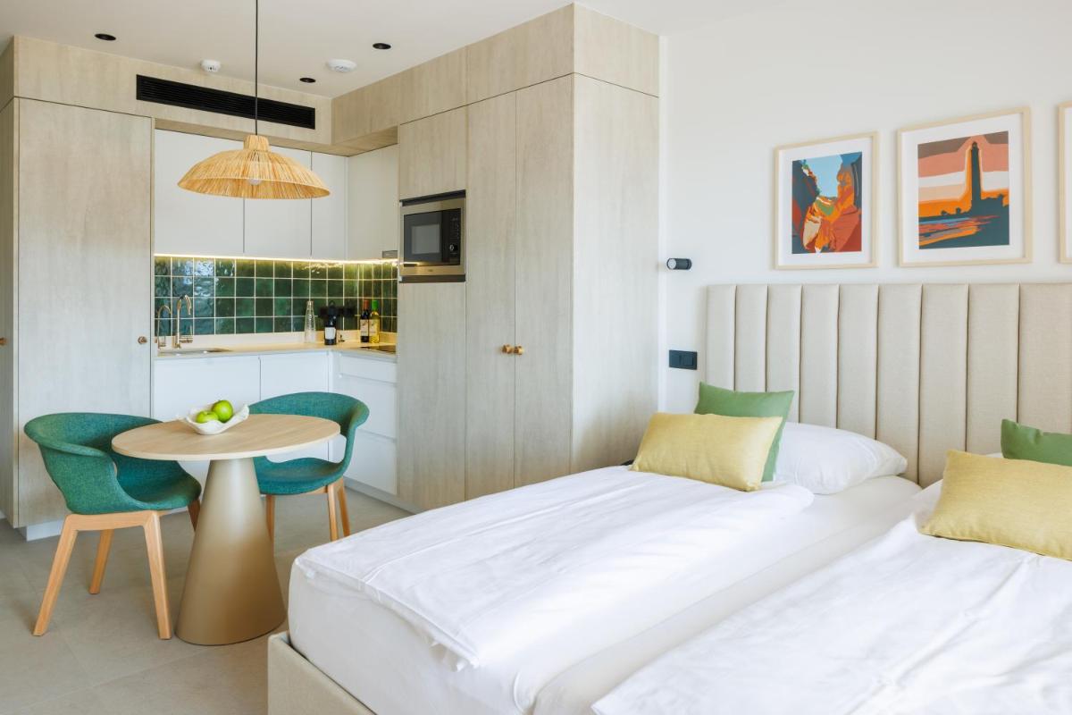 Cama o camas de una habitación en Hapimag San Agustín