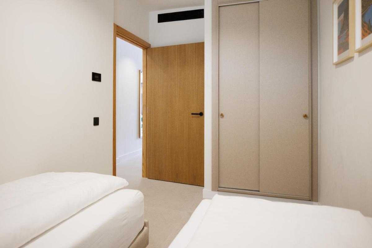 Cama o camas de una habitación en Hapimag San Agustín