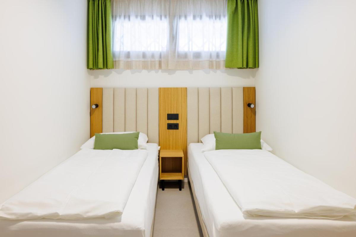 Cama o camas de una habitación en Hapimag San Agustín