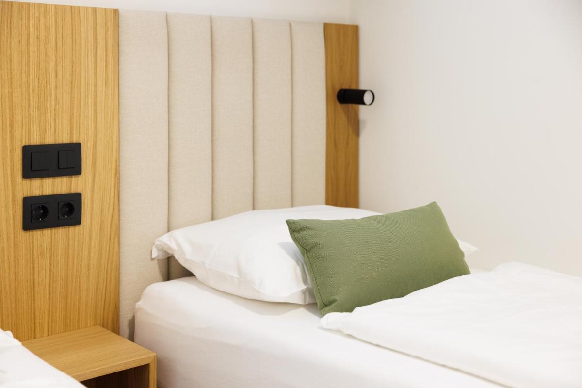 Cama o camas de una habitación en Hapimag San Agustín