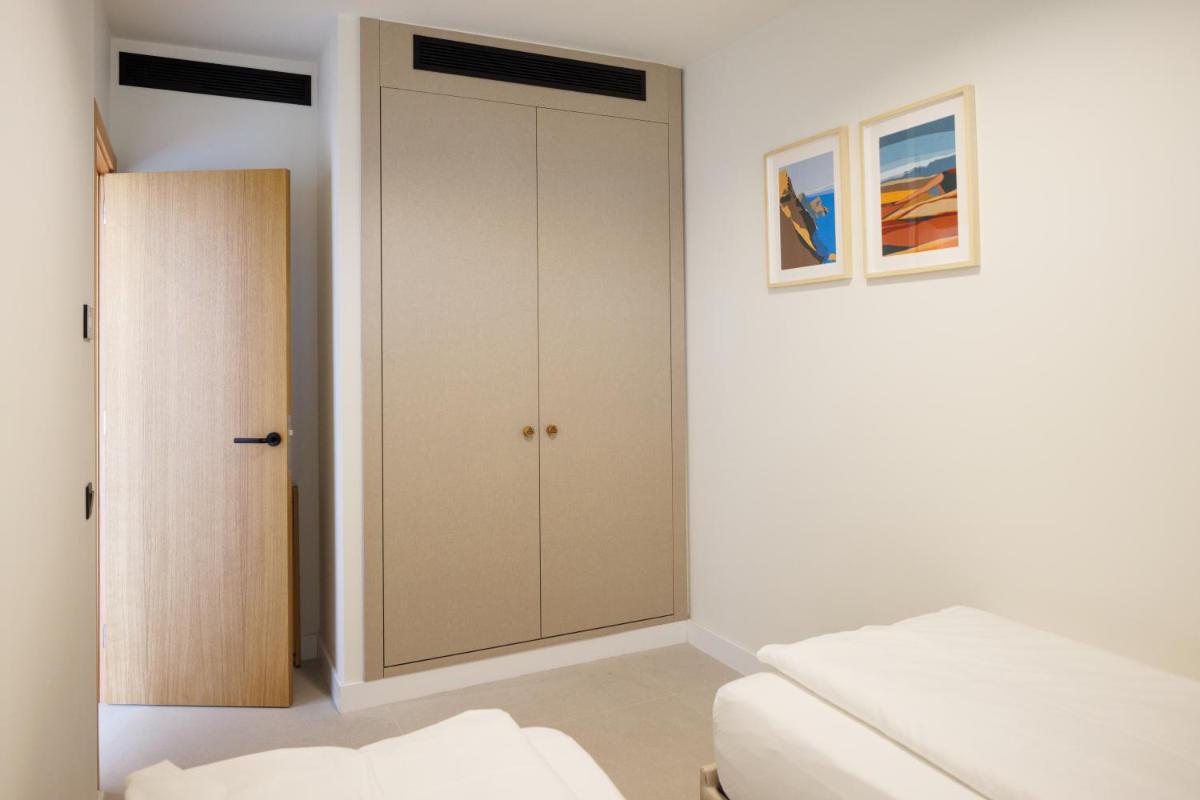 Cama o camas de una habitación en Hapimag San Agustín