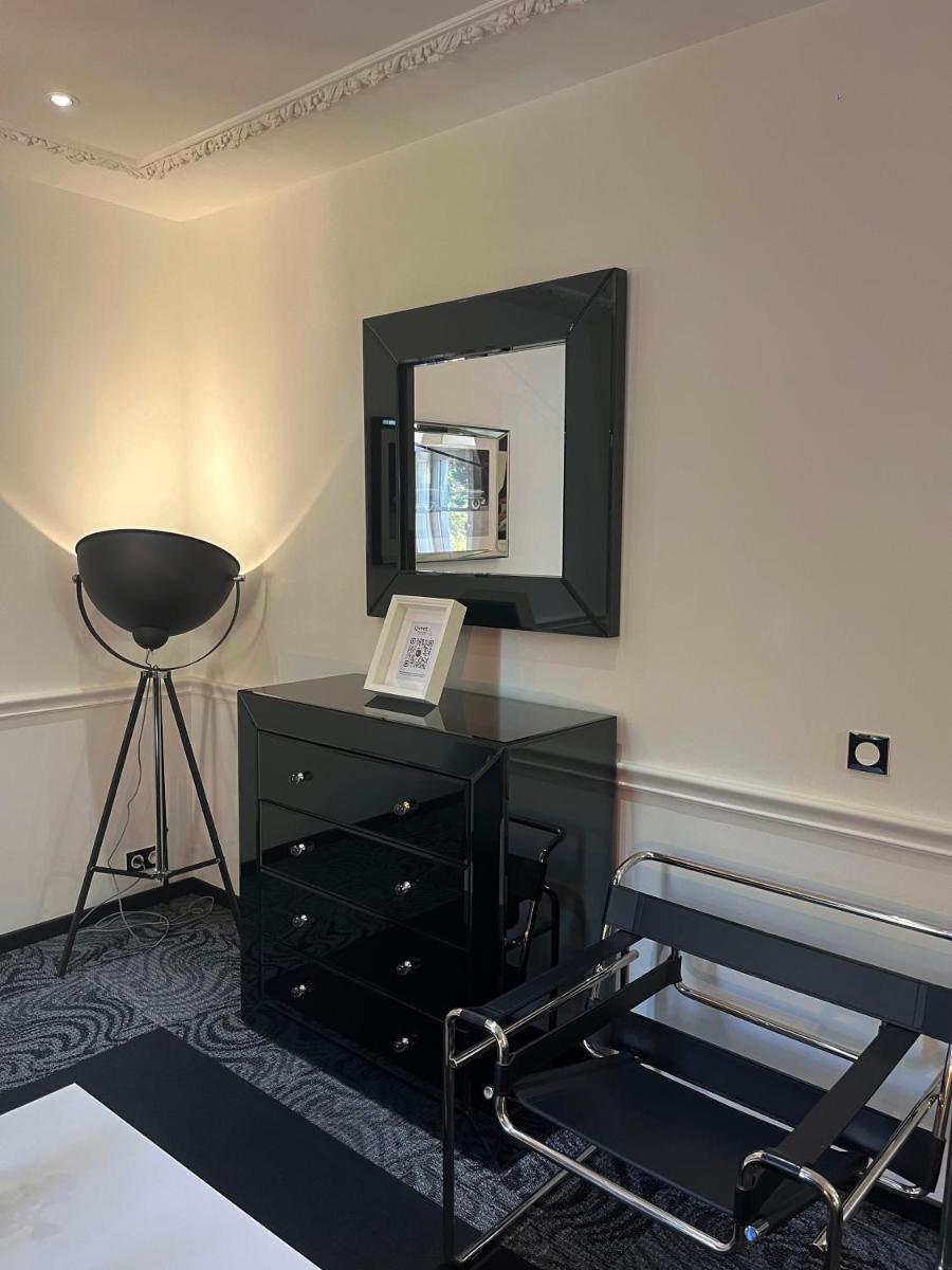Télévision ou salle de divertissement dans l'établissement Art Hotel