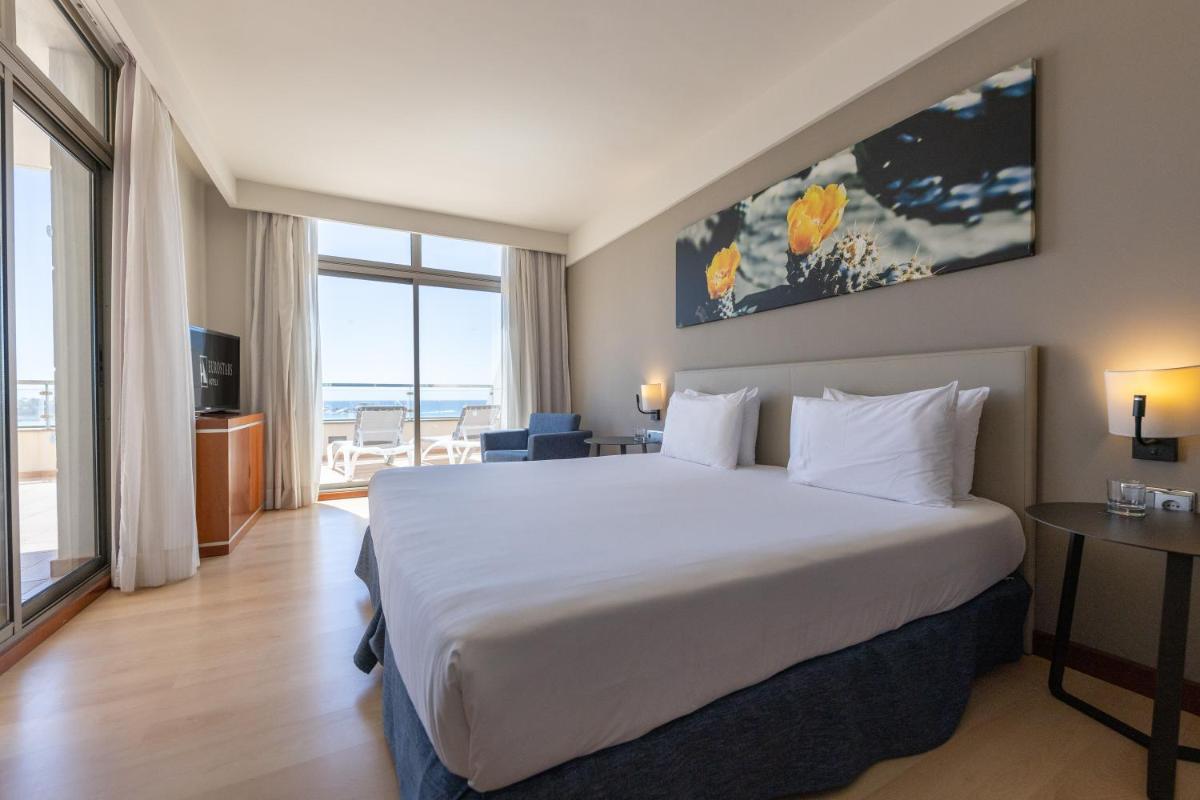 Cama o camas de una habitación en Eurostars Las Salinas