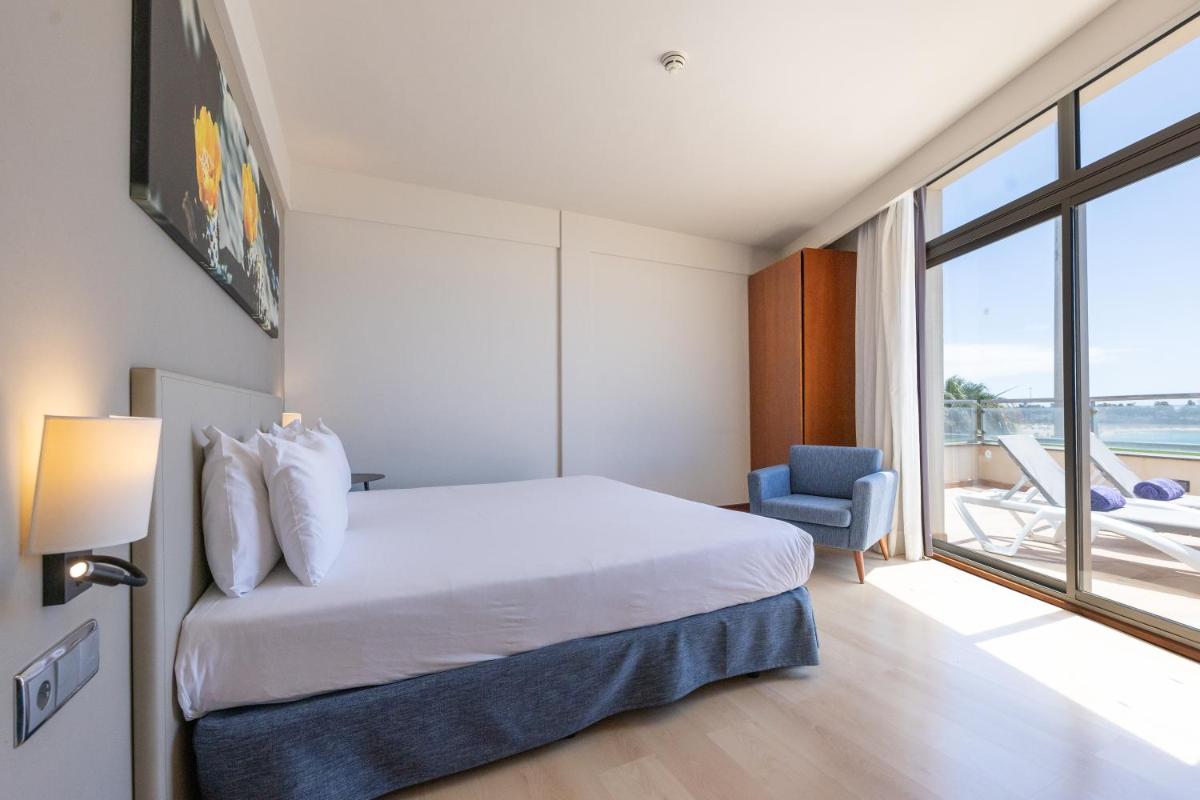 Cama o camas de una habitación en Eurostars Las Salinas