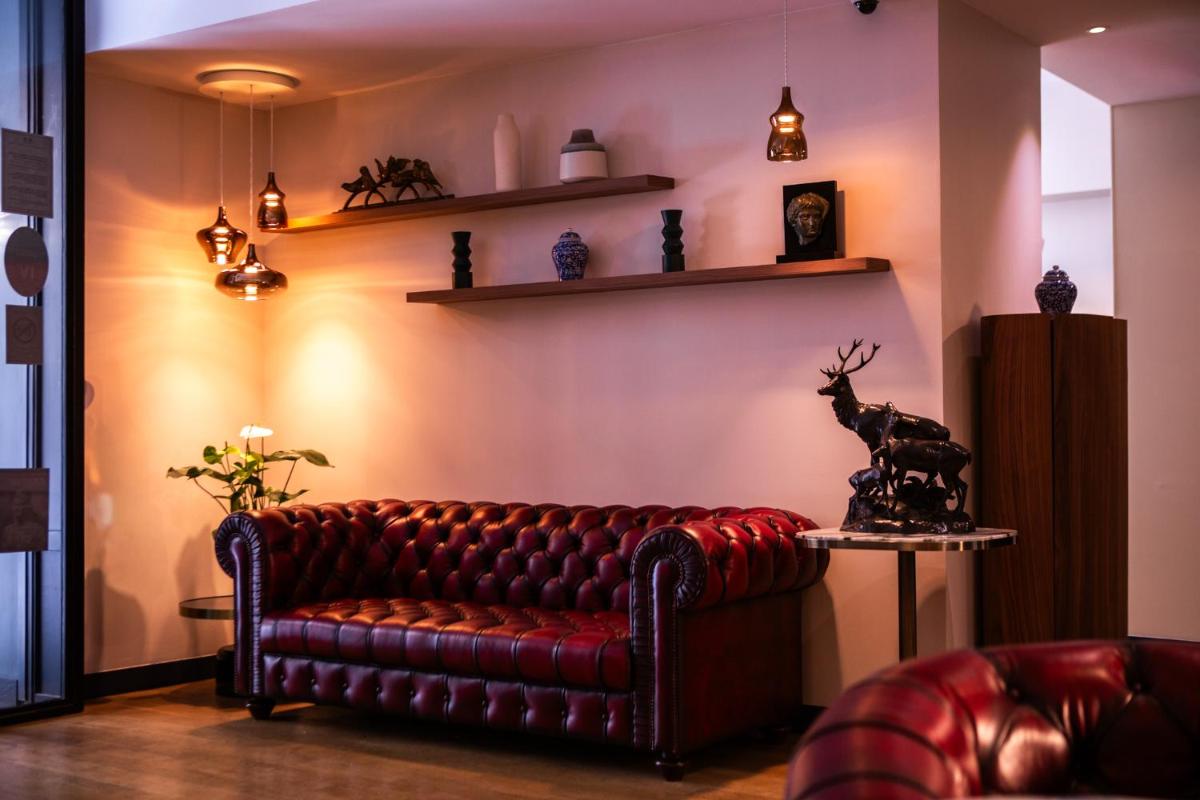 Coin salon dans l'établissement Hotel Monsieur & Spa