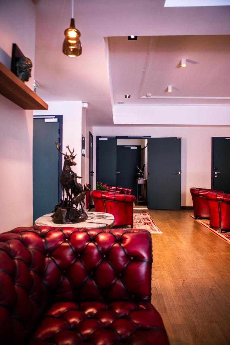 Coin salon dans l'établissement Hotel Monsieur & Spa