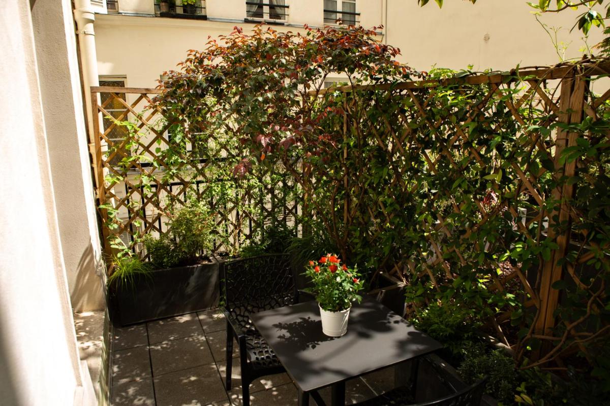 Jardin de l'établissement Hotel Monsieur & Spa
