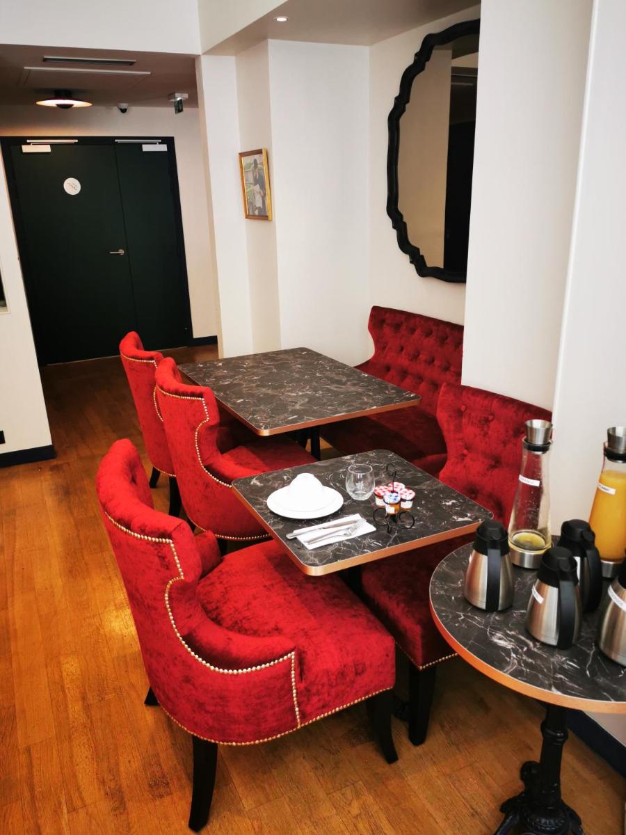 Coin salon dans l'établissement Hotel Monsieur & Spa