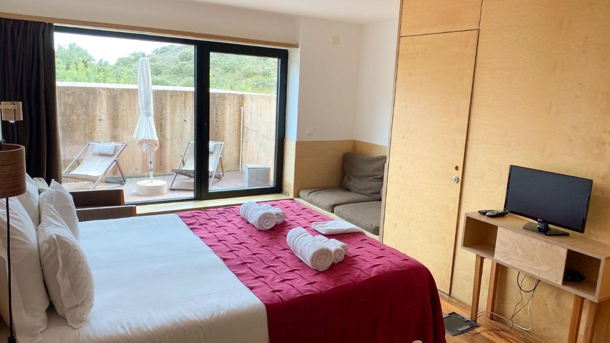Uma cama ou camas num quarto em Colmeal Countryside Hotel