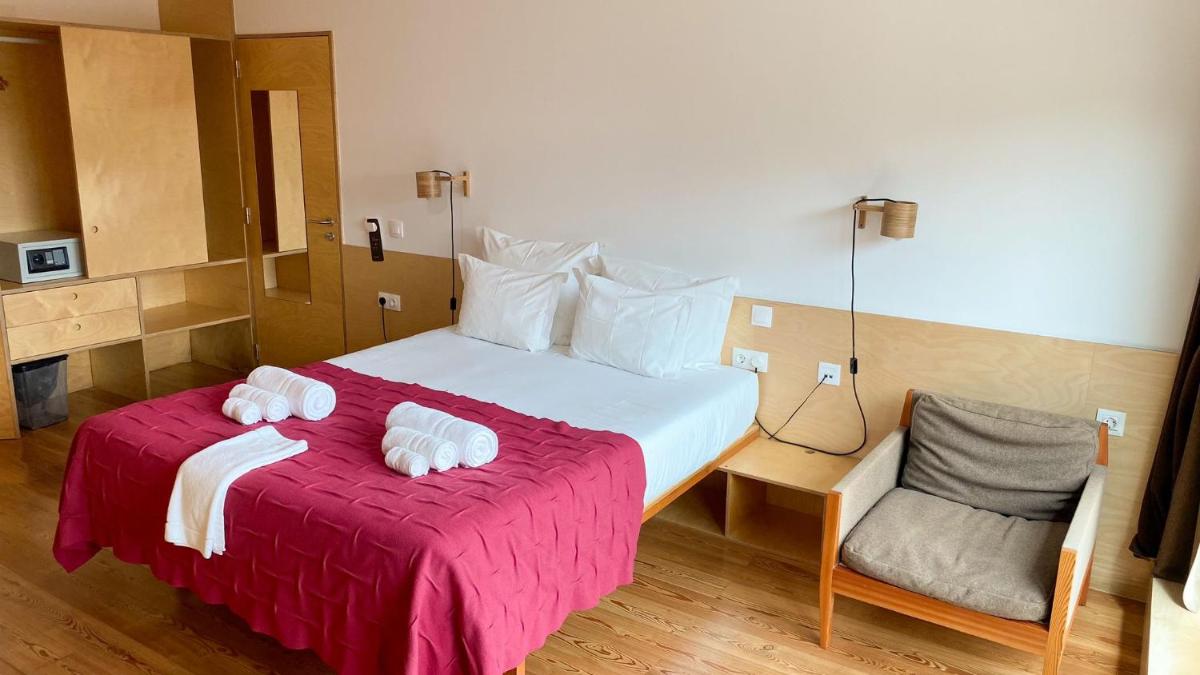 Uma cama ou camas num quarto em Colmeal Countryside Hotel
