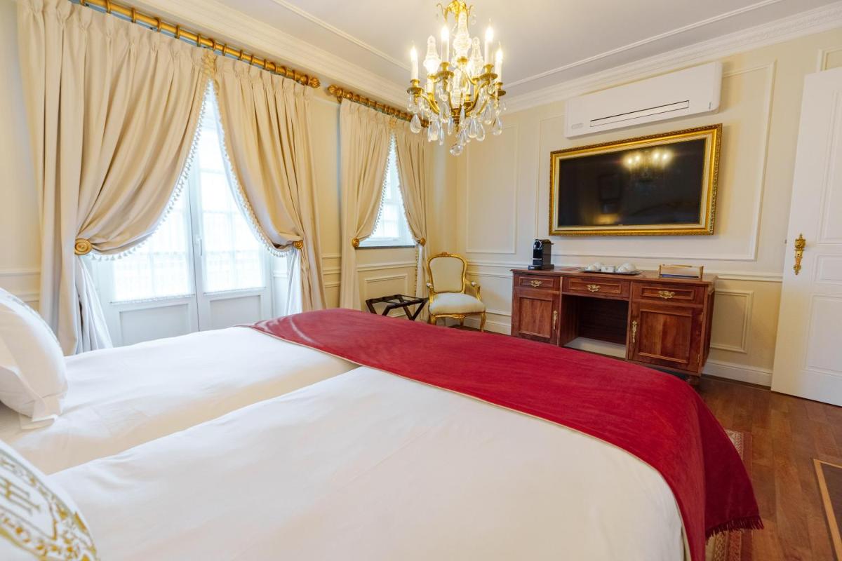 Uma cama ou camas num quarto em Boutique Hotel Teatro