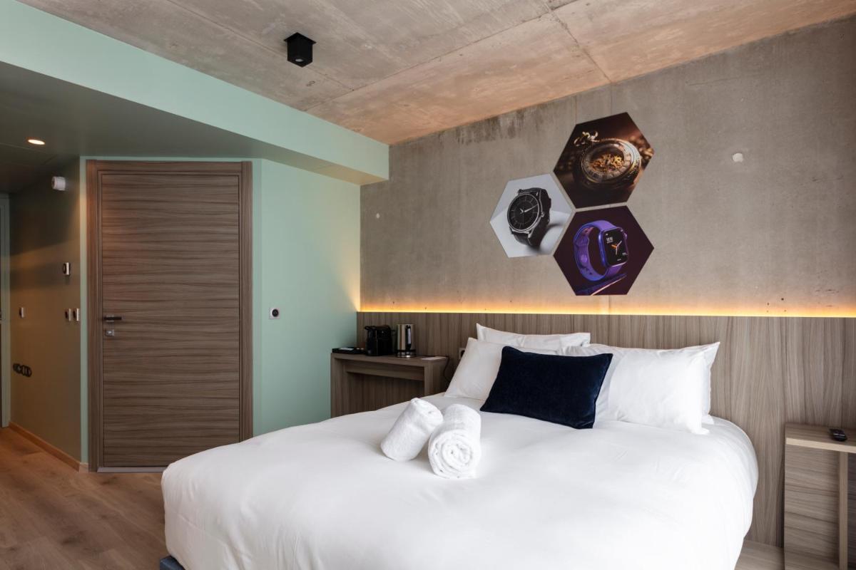 Un ou plusieurs lits dans un hébergement de l'établissement Ki Space Hotel & Spa - near Disneyland Paris