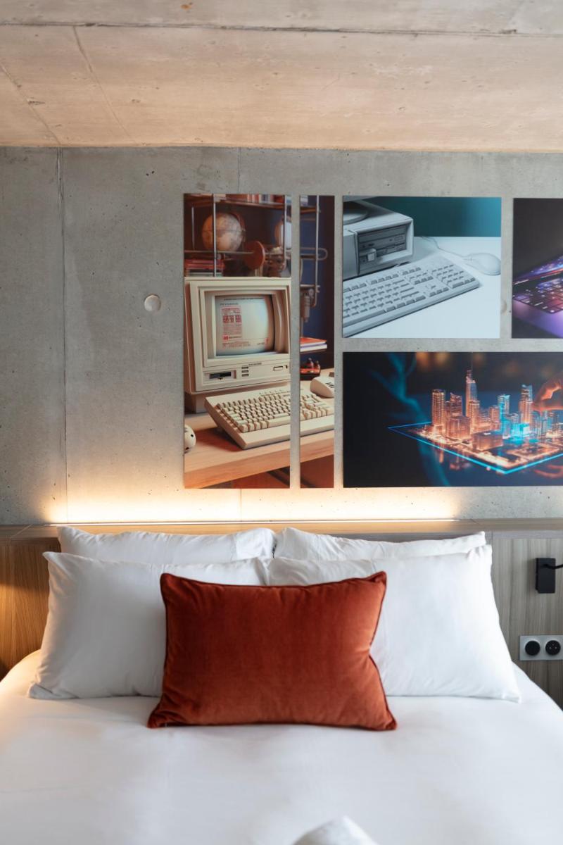 Un ou plusieurs lits dans un hébergement de l'établissement Ki Space Hotel & Spa - near Disneyland Paris