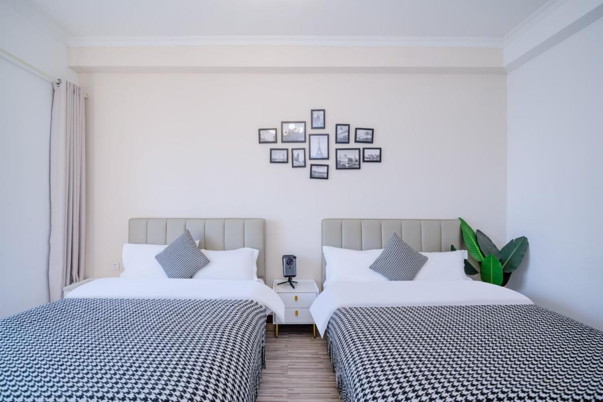 Guangzhou Lijing Aparthotel Pazhou Exhibition Center - Next to Exit D of Wanshengwei MTR Station - Housity