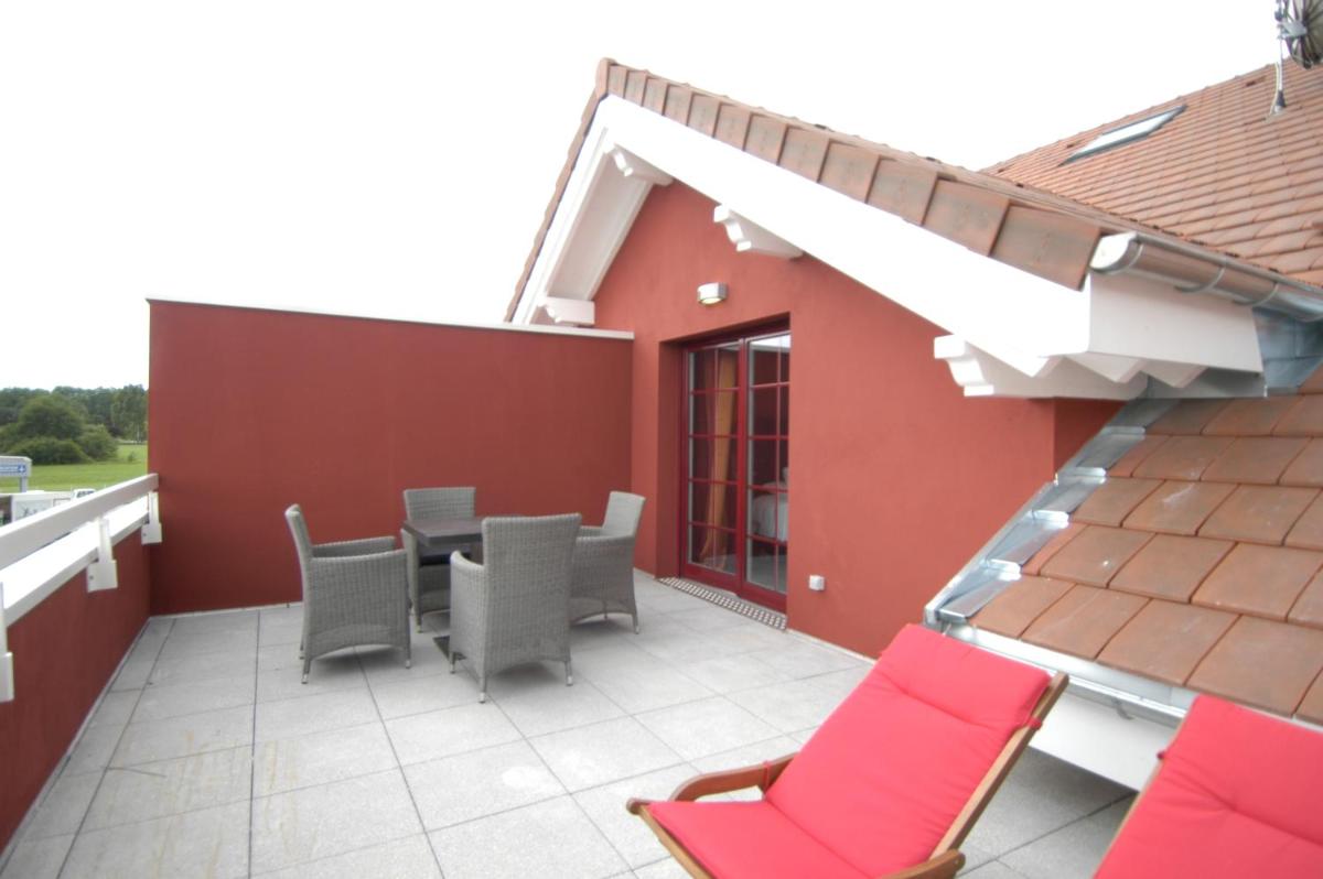 Balcon ou terrasse dans l'établissement Auberge De Maison Rouge