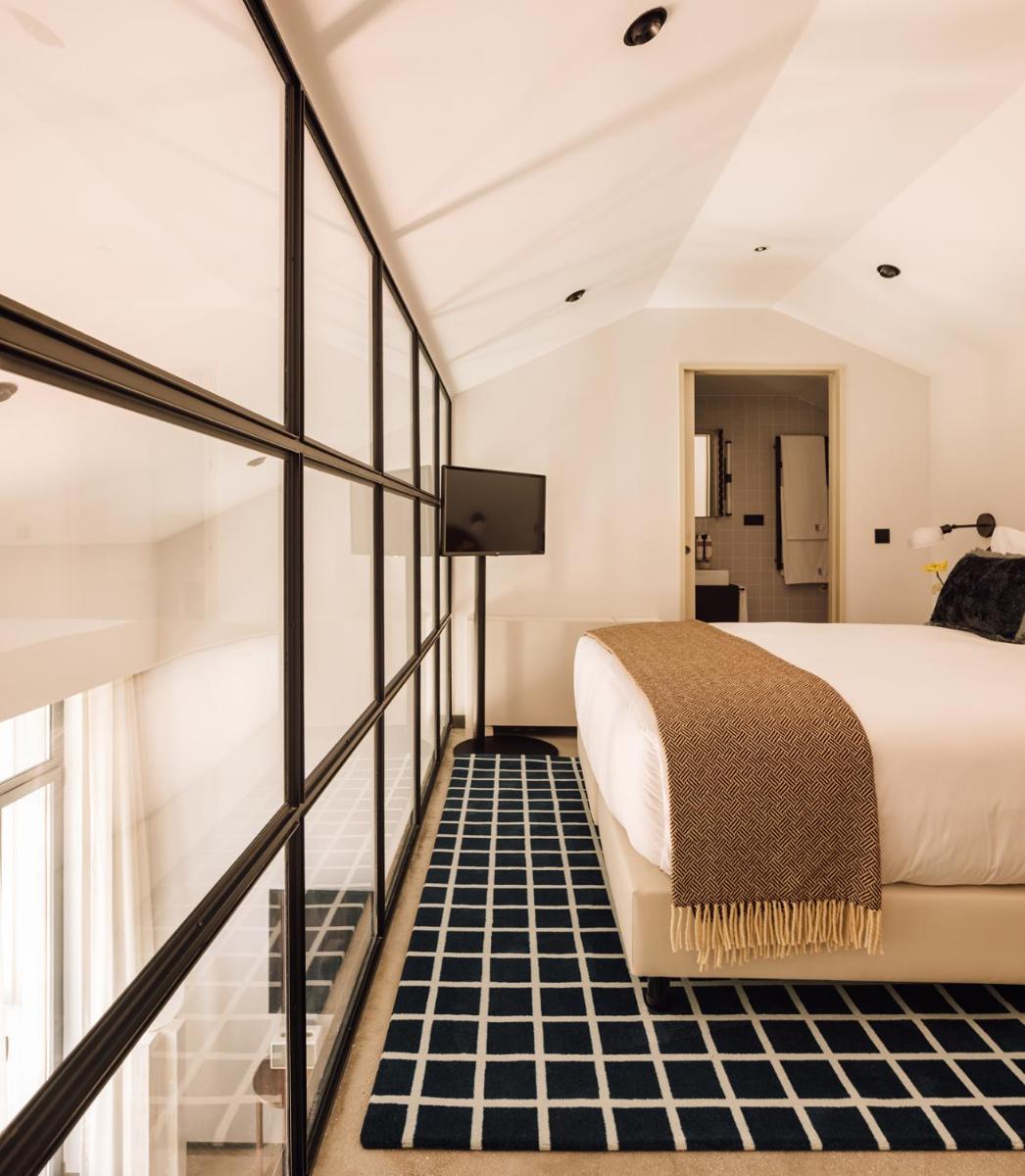 Uma cama ou camas num quarto em The Rebello Hotel & Spa - Small Luxury Hotels Of The World