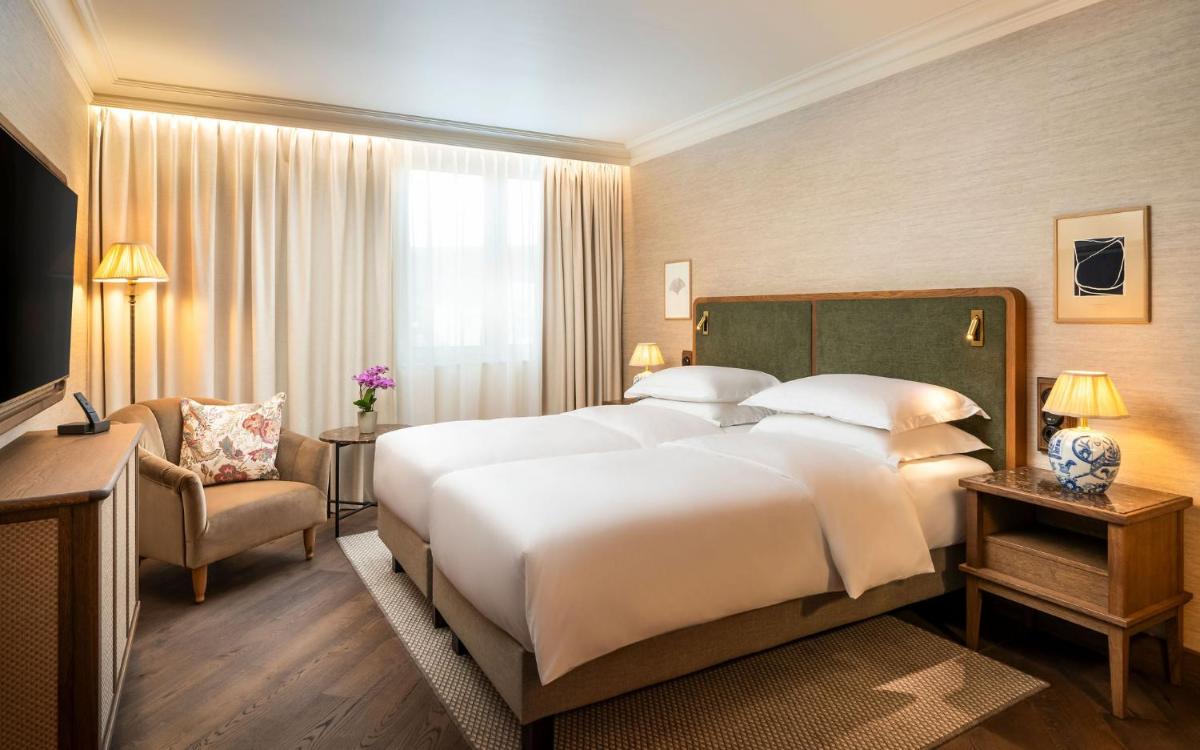Ein Bett oder Betten in einem Zimmer der Unterkunft Brunfels Hotel, in the Unbound Collection by Hyatt