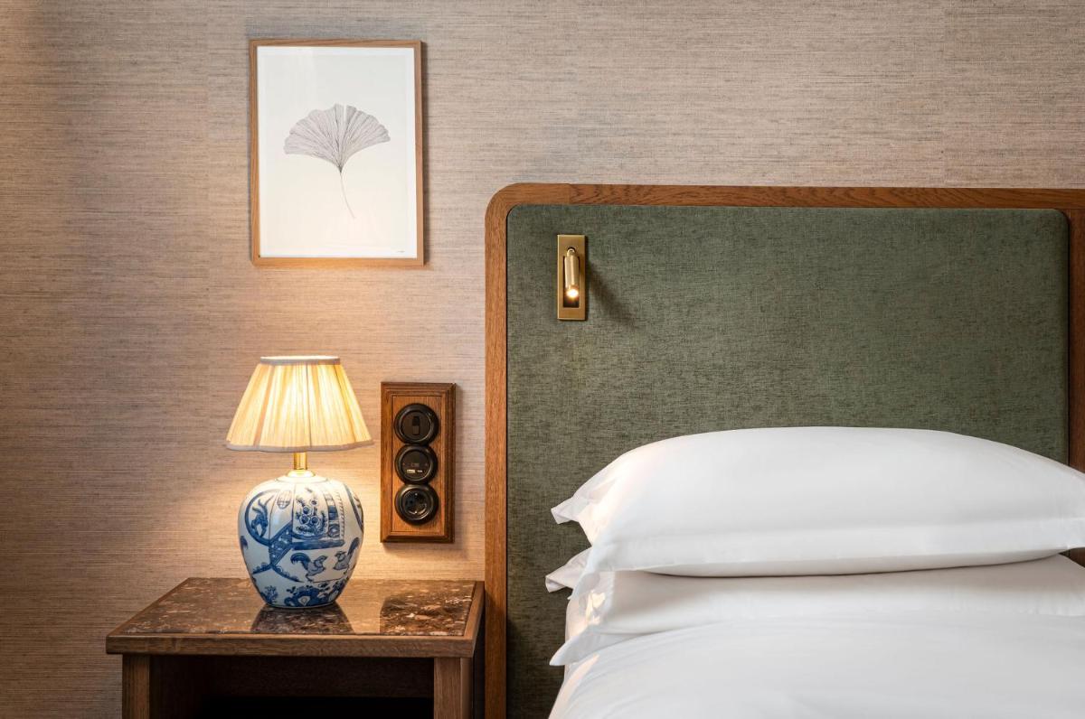 Ein Bett oder Betten in einem Zimmer der Unterkunft Brunfels Hotel, in the Unbound Collection by Hyatt