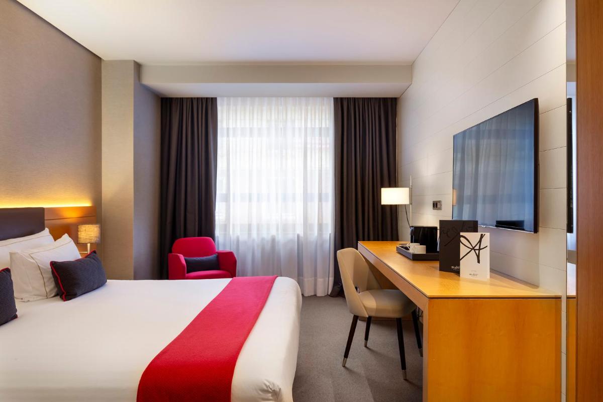 Cama o camas de una habitación en The Artist Grand Hotel of Art