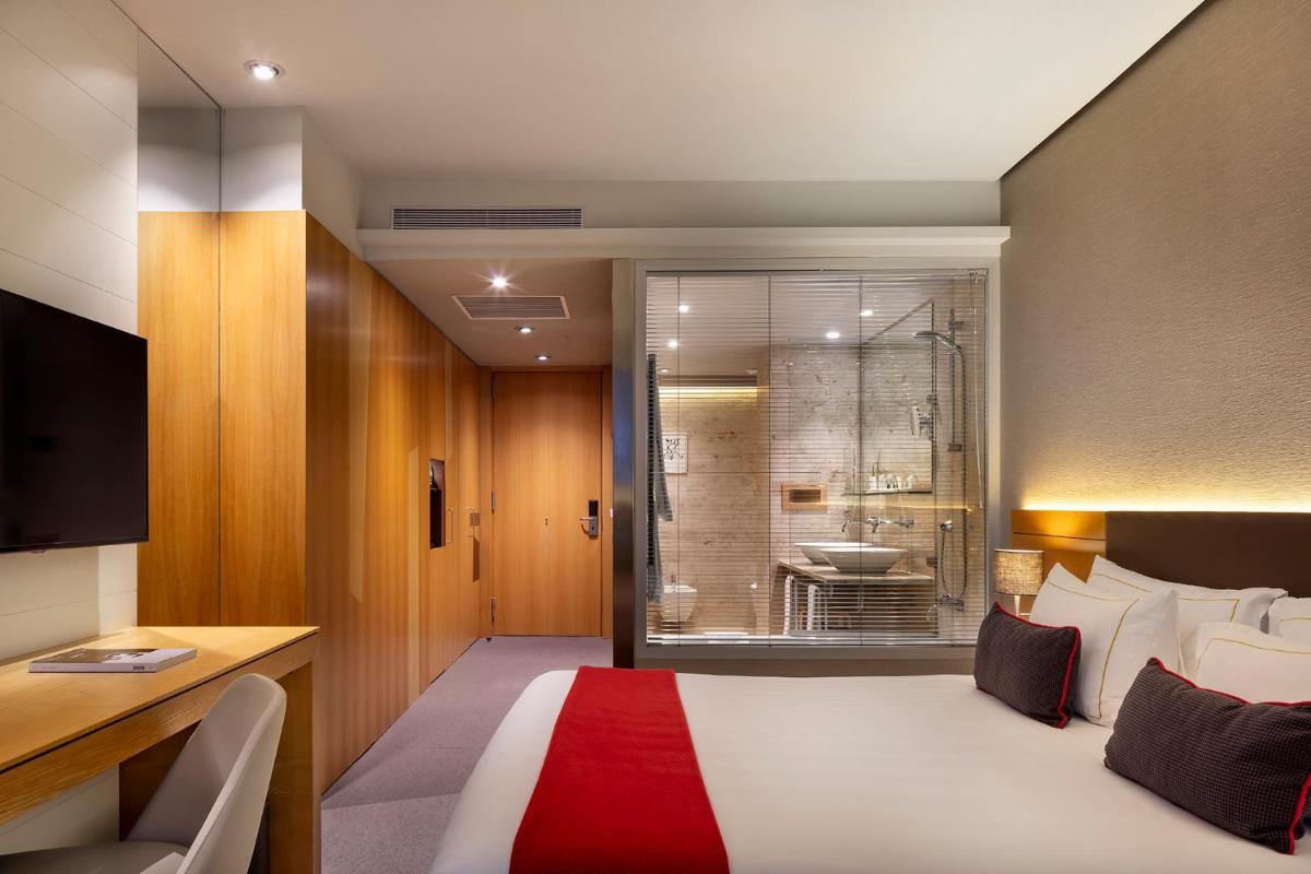 Cama o camas de una habitación en The Artist Grand Hotel of Art