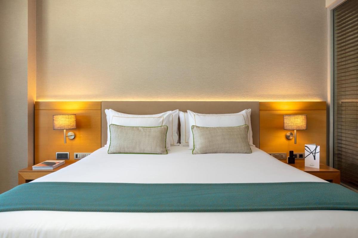 Cama o camas de una habitación en The Artist Grand Hotel of Art