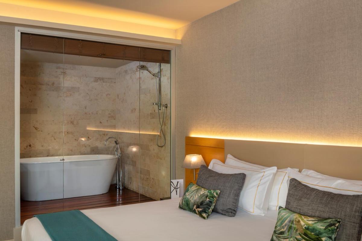 Cama o camas de una habitación en The Artist Grand Hotel of Art