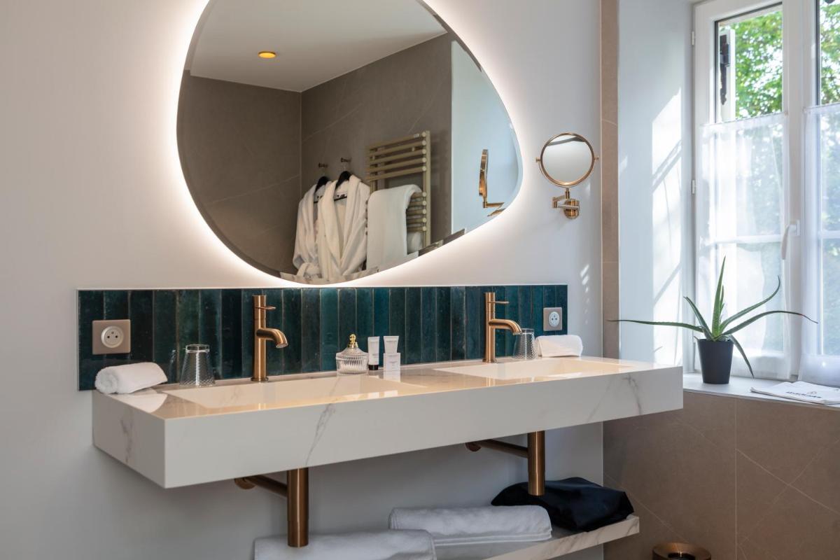 Salle de bains dans l'établissement Le Clos Alice