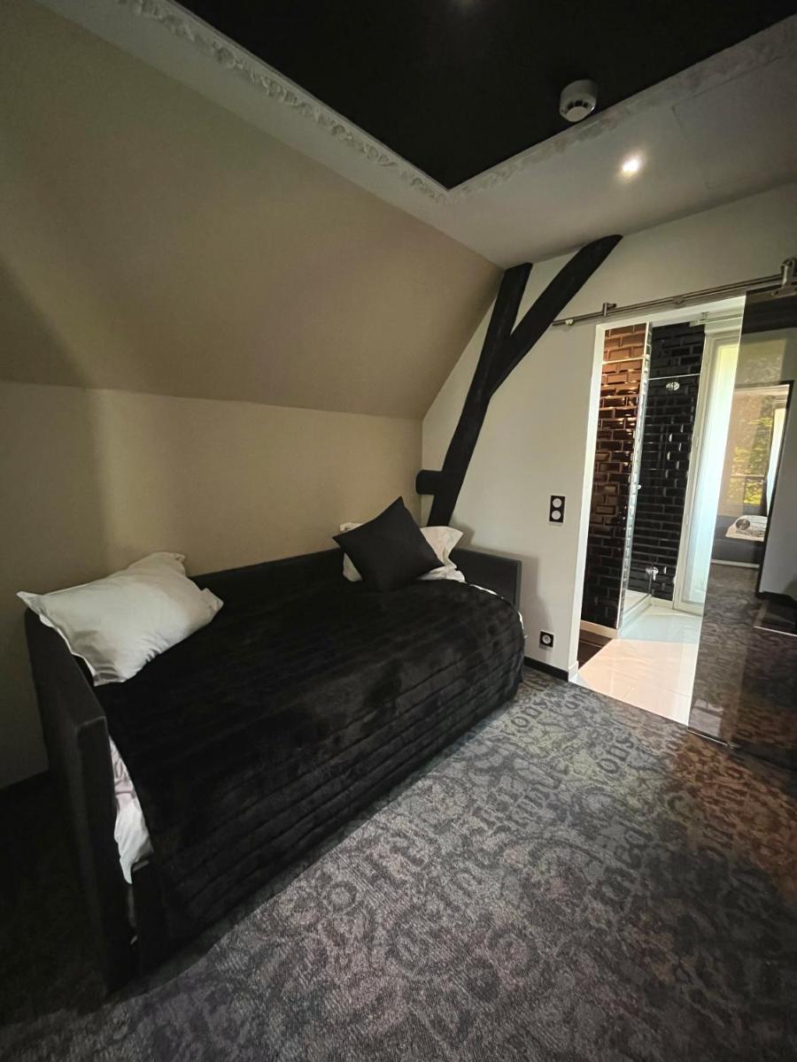 Un ou plusieurs lits dans un hébergement de l'établissement Art Hotel