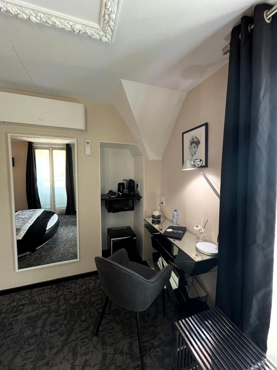 Un ou plusieurs lits dans un hébergement de l'établissement Art Hotel
