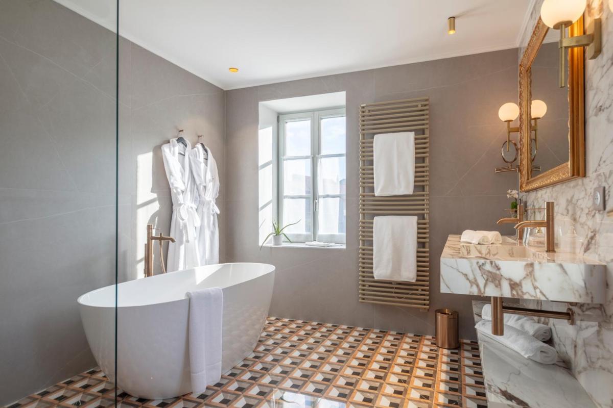 Salle de bains dans l'établissement Le Clos Alice