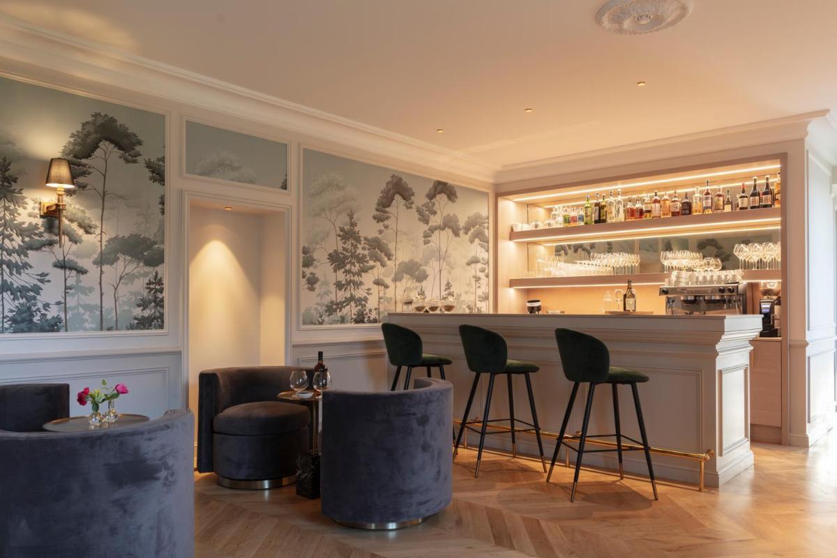 Salon ou bar de l'établissement Le Clos Alice