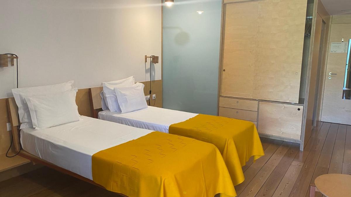 Uma cama ou camas num quarto em Colmeal Countryside Hotel