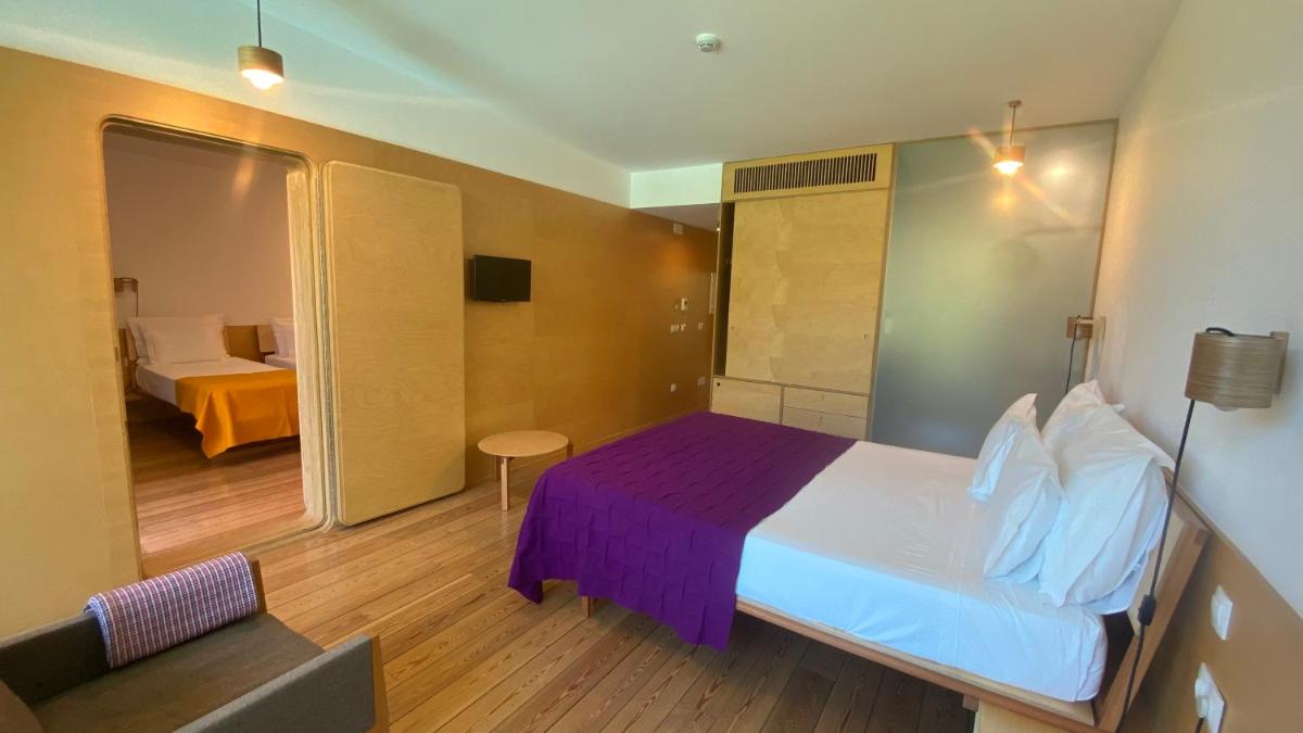 Uma cama ou camas num quarto em Colmeal Countryside Hotel