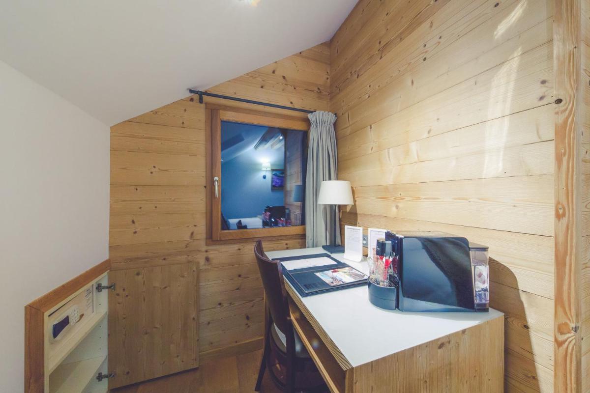 Cuisine ou kitchenette dans l'établissement Fleur De Neige Châtel
