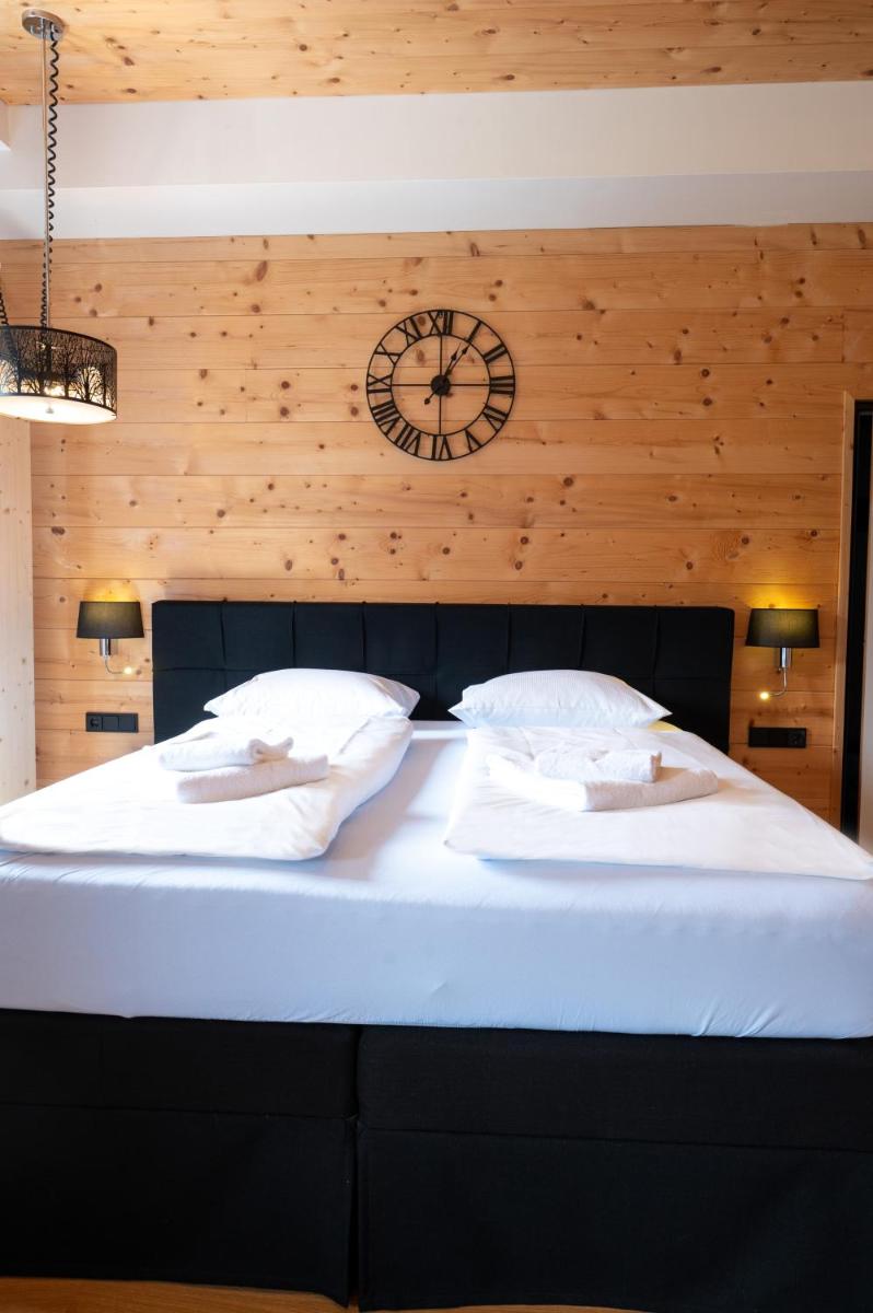 Ein Bett oder Betten in einem Zimmer der Unterkunft Design Hotel ALPENLIEBE - - - - Boutique-Flair - - - -