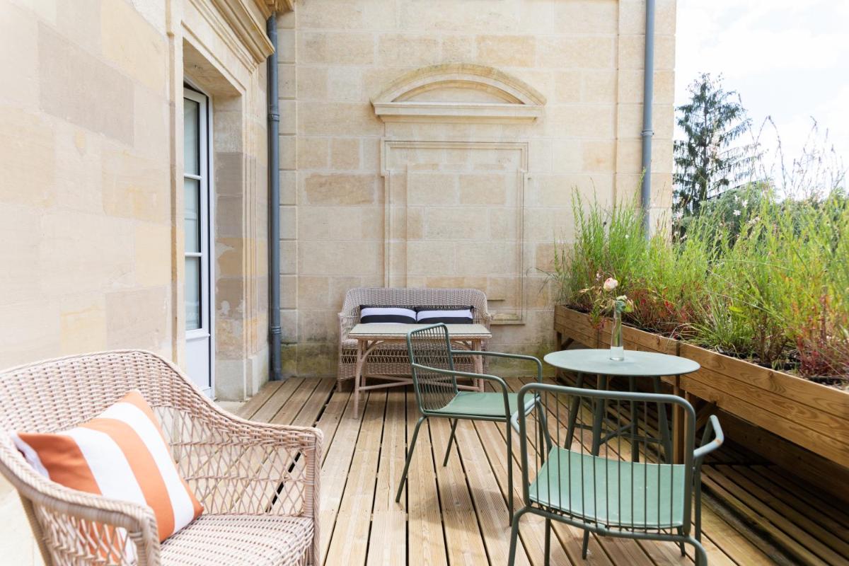 Balcon ou terrasse dans l'établissement Château Léognan, Domaine viticole - proche Bordeaux