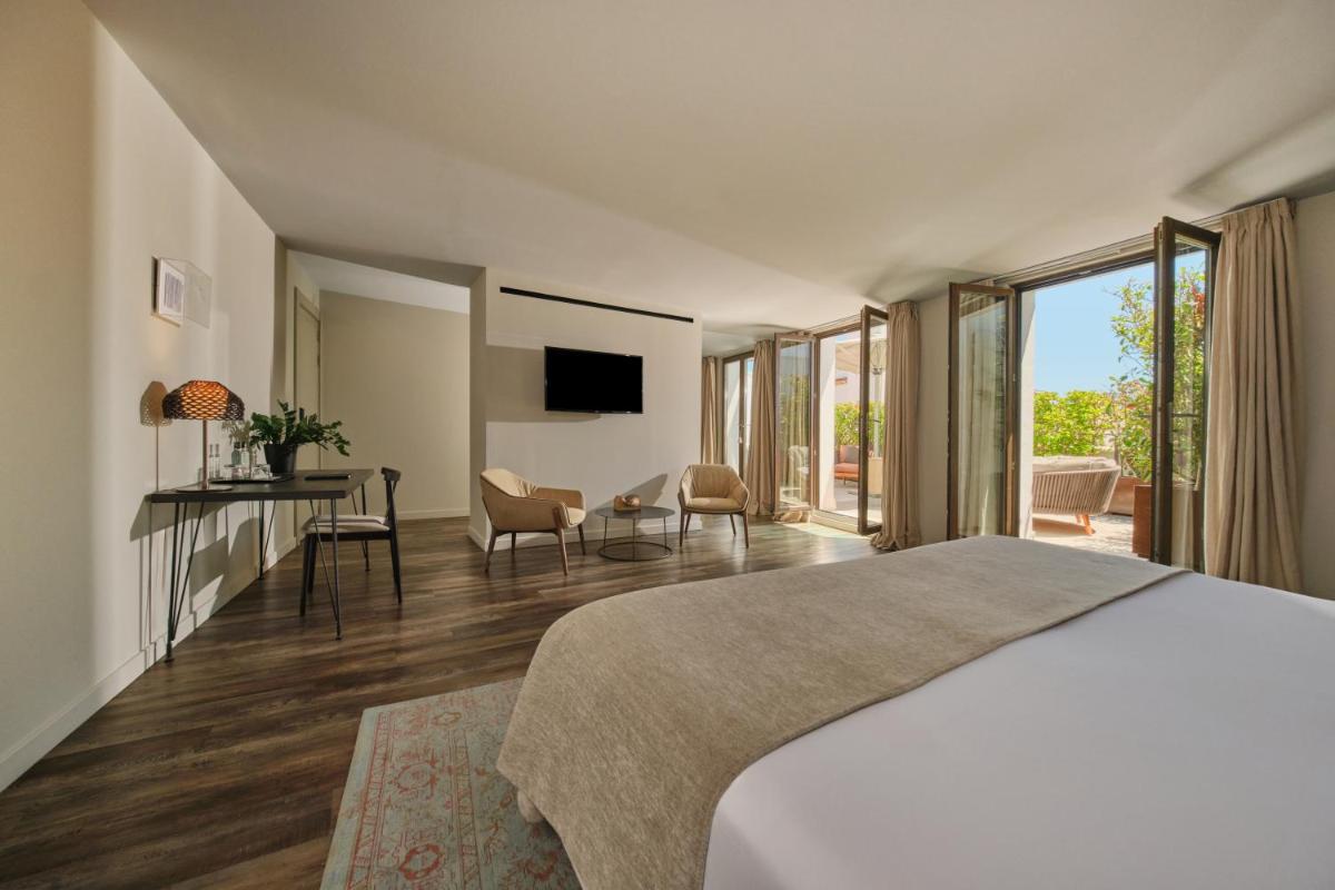 Cama o camas de una habitación en Sant Jaume Design Hotel