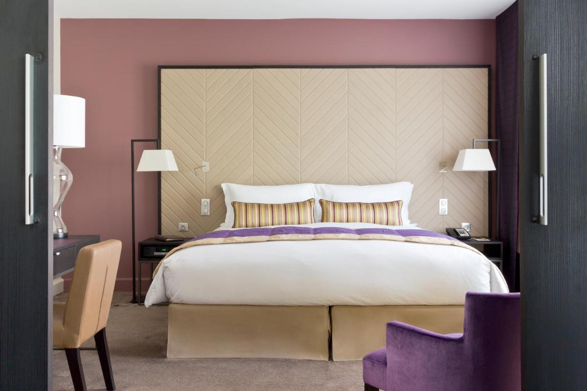 Un ou plusieurs lits dans un hébergement de l'établissement Sofitel Strasbourg Grande Ile