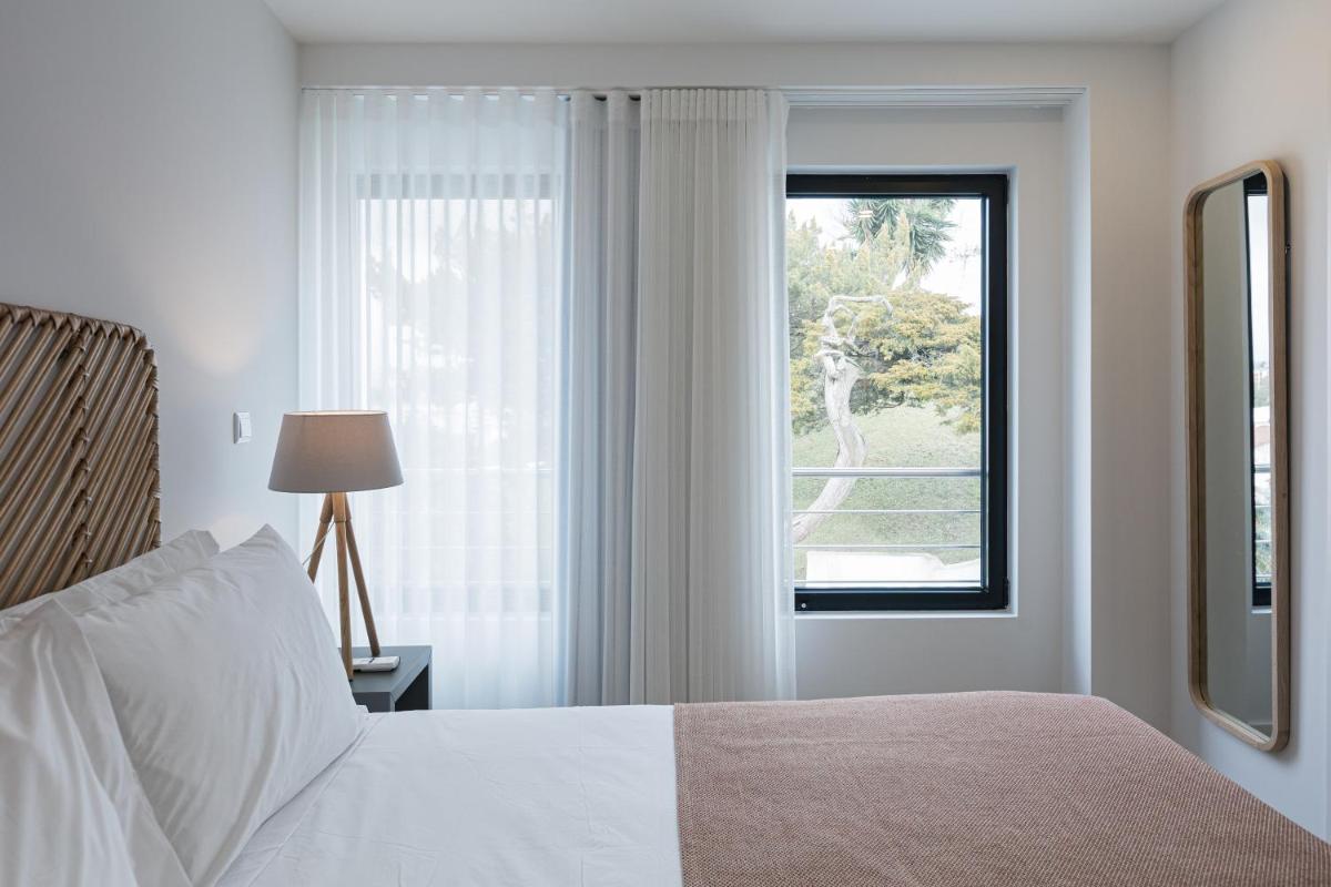 Uma cama ou camas num quarto em Alto do Forte