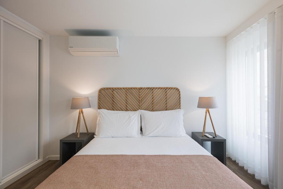 Uma cama ou camas num quarto em Alto do Forte
