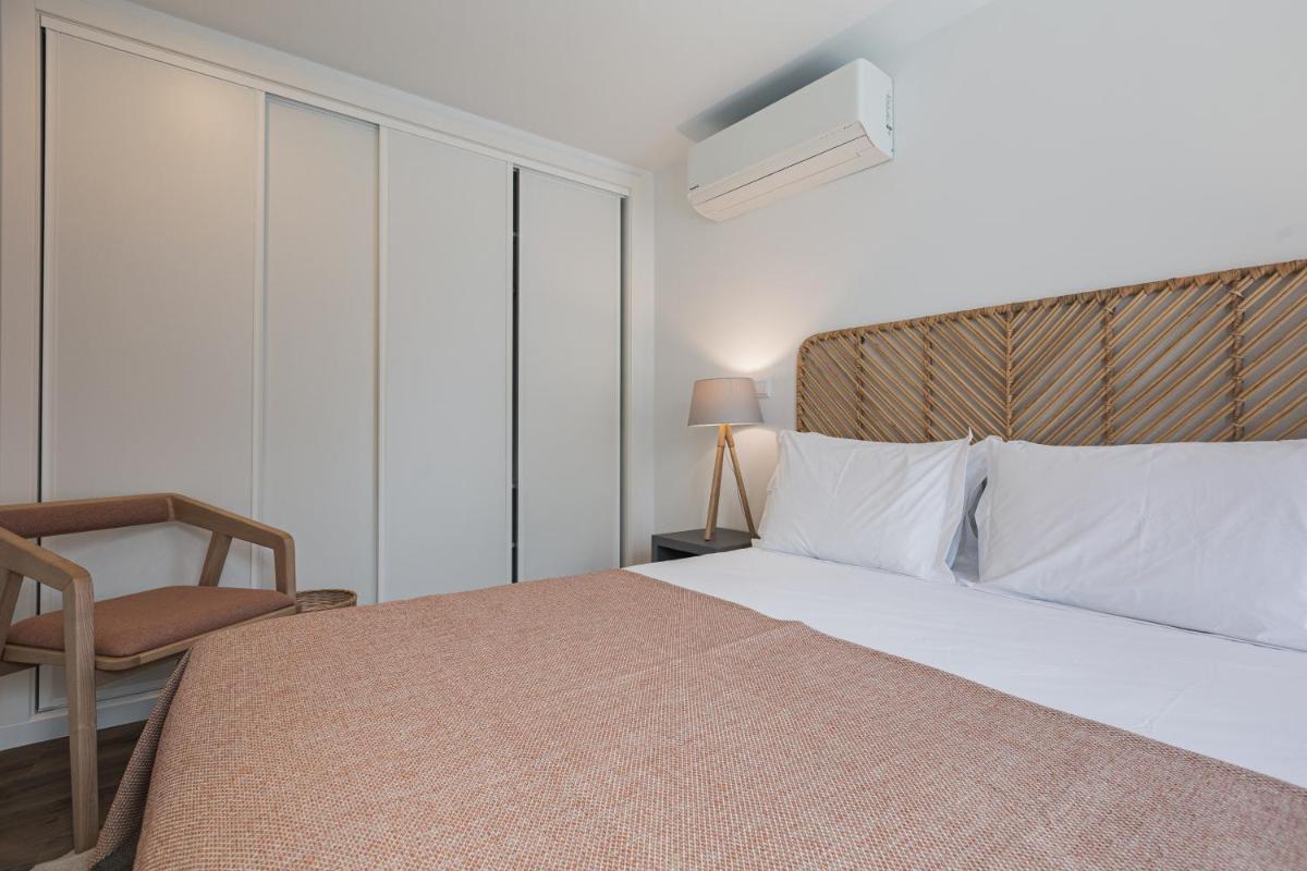 Uma cama ou camas num quarto em Alto do Forte