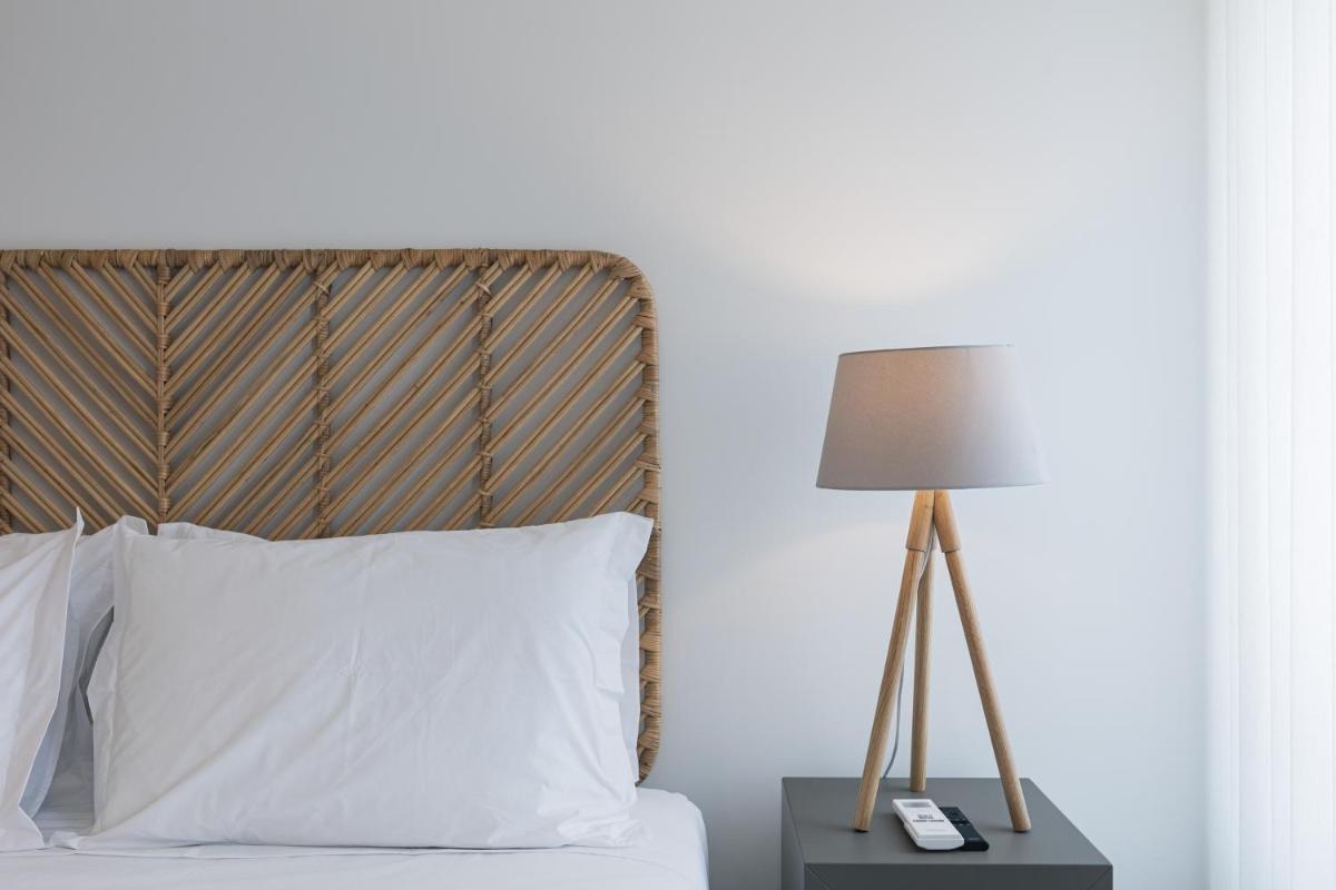 Uma cama ou camas num quarto em Alto do Forte