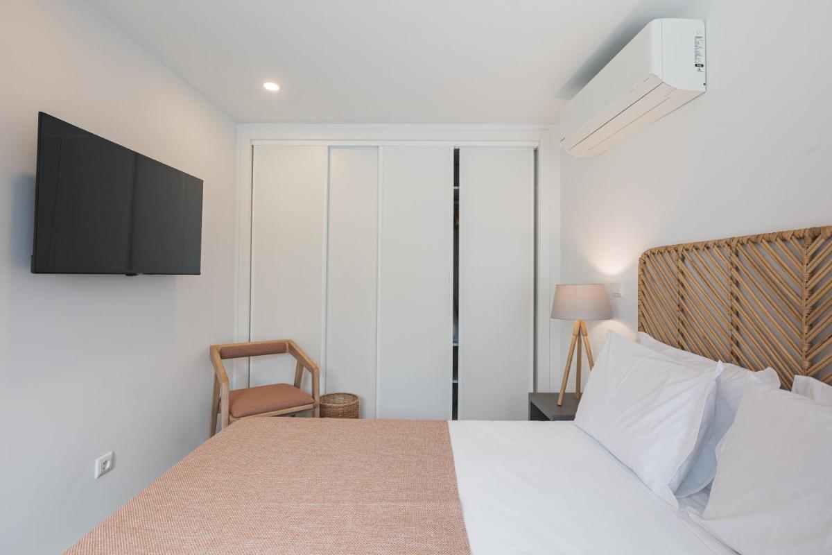 Uma cama ou camas num quarto em Alto do Forte