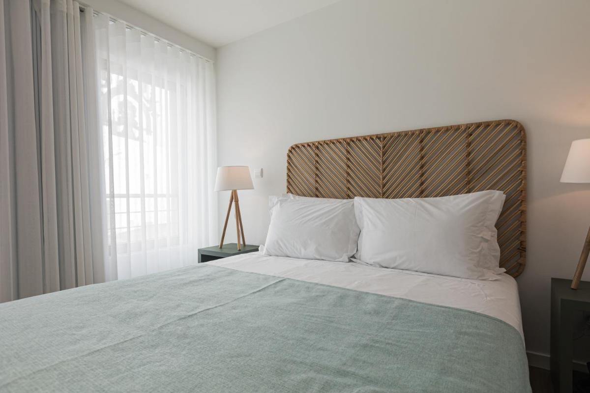 Uma cama ou camas num quarto em Alto do Forte
