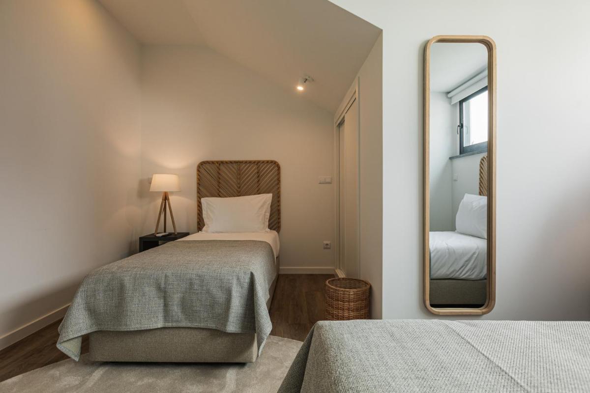 Uma cama ou camas num quarto em Alto do Forte