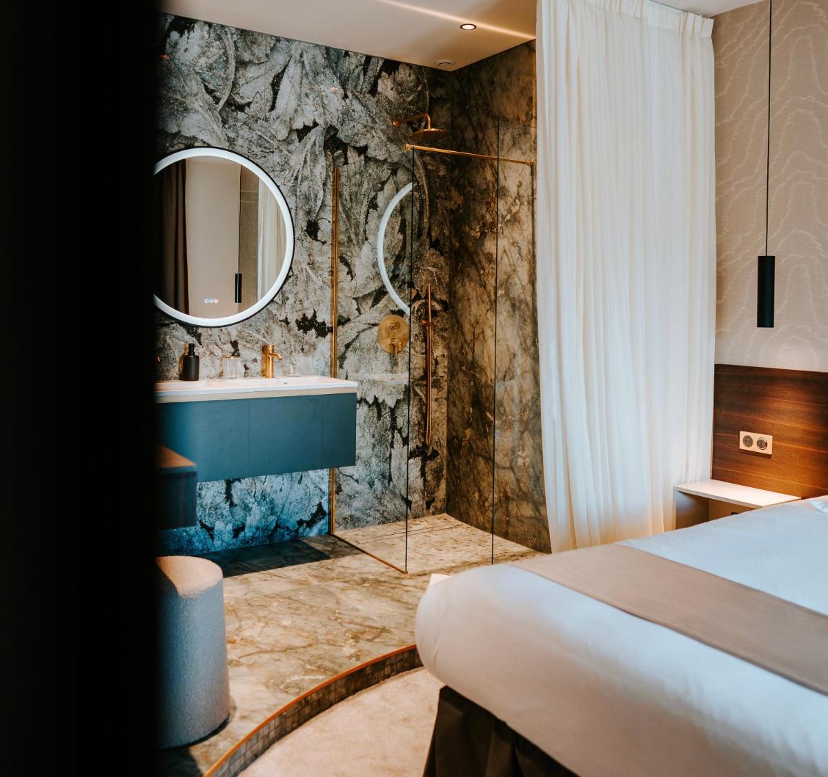 Un ou plusieurs lits dans un hébergement de l'établissement Hôtel Fesch & Spa