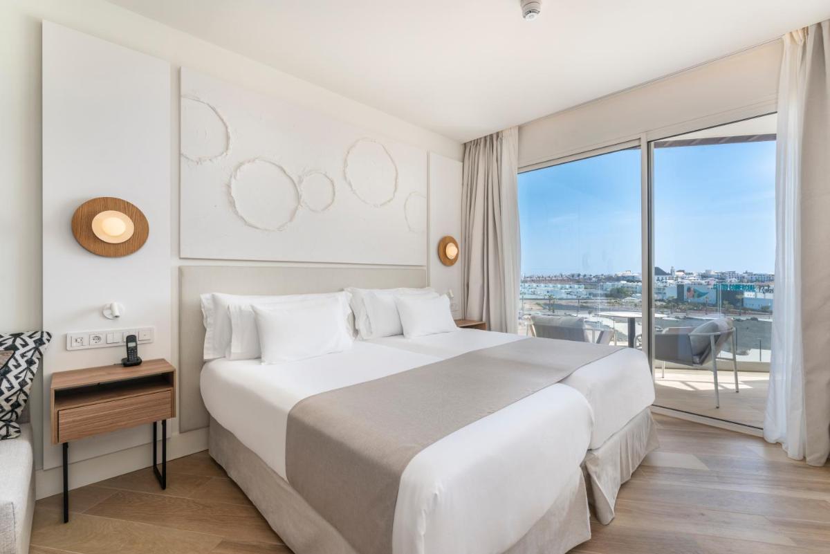 Cama o camas de una habitación en Barceló Playa Blanca